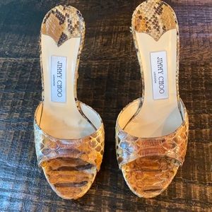 JIMMY CHOO size 37 ( I wear 6.5) and worn once.
